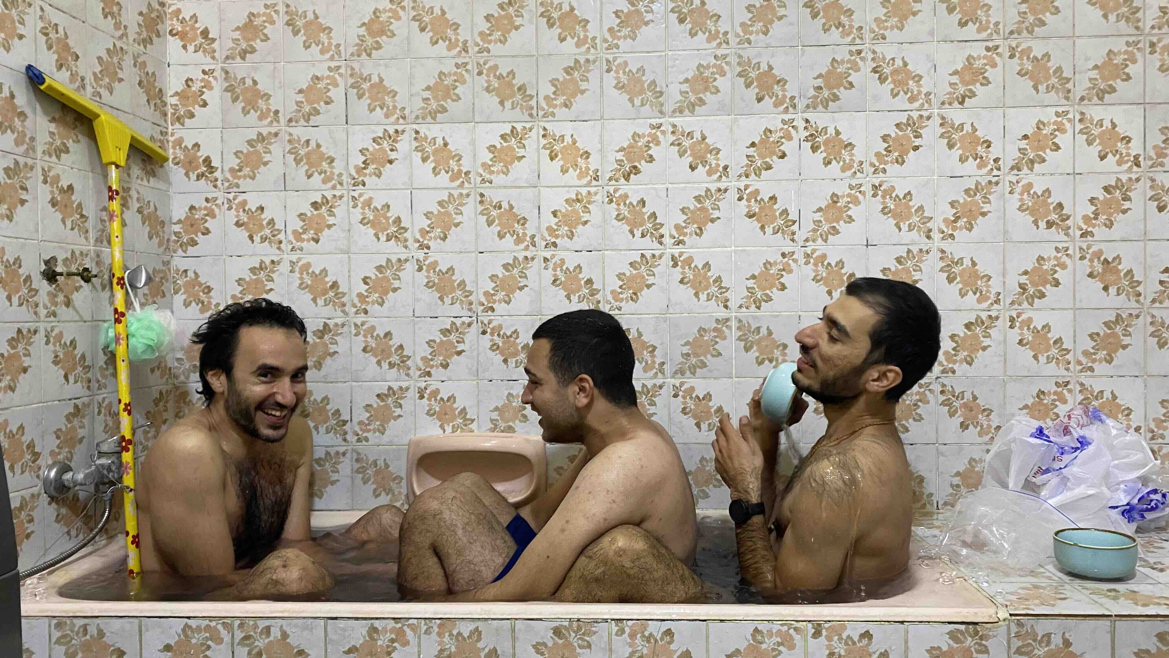 Mujtaba, Murtadha, and Saif in the bathtub.